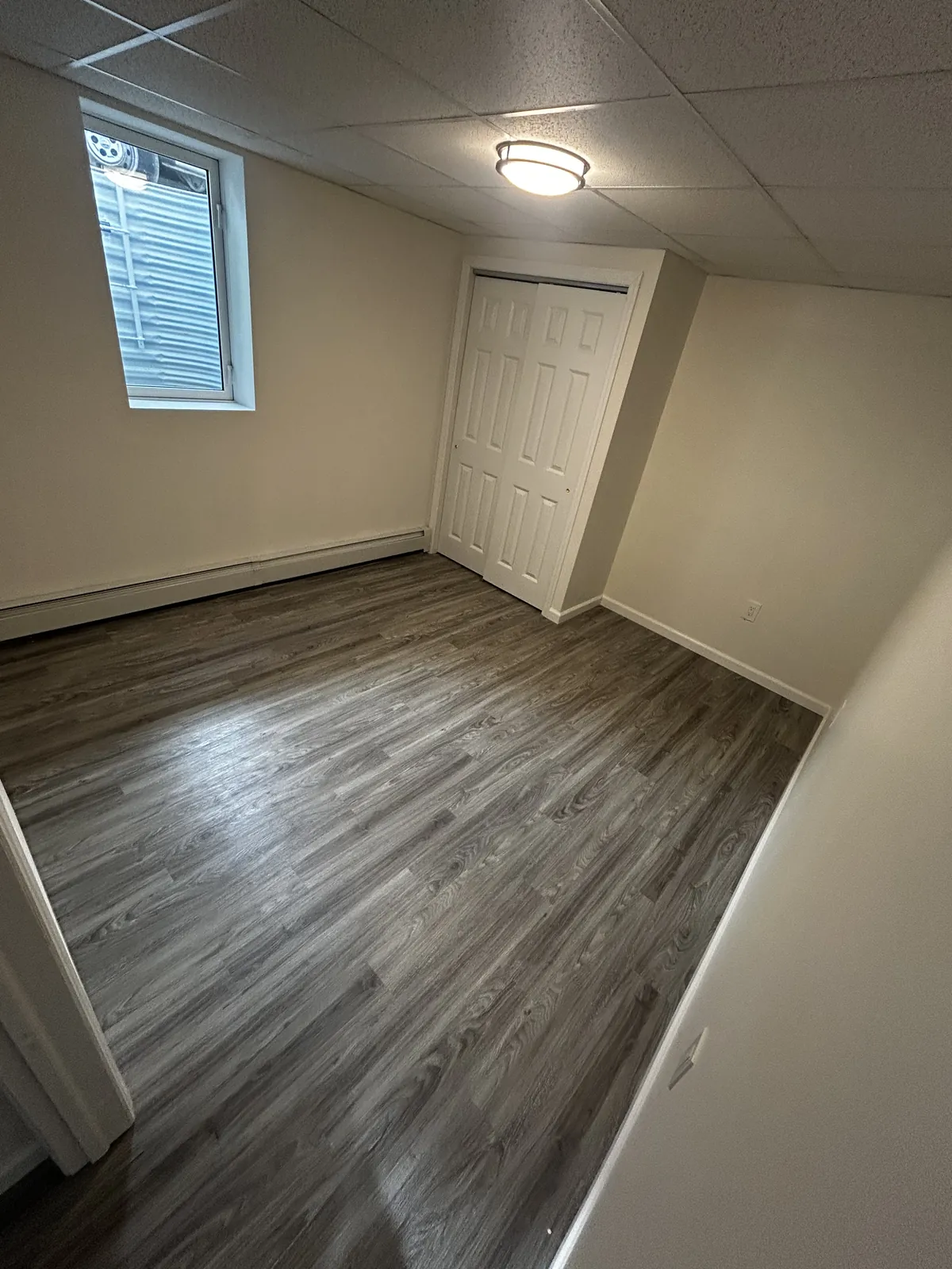 Basement conversion with custom finishes in Long Island
